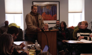 County reaches last-minute road pact