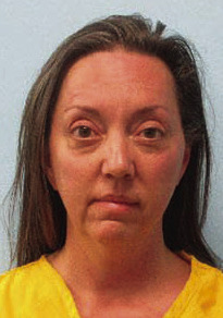 Police: Axe-wielding woman destroyed bear statue