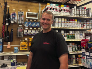 Shop owner swaps calculator for chisel